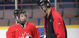 Youth hockey player looks to adult for guidance